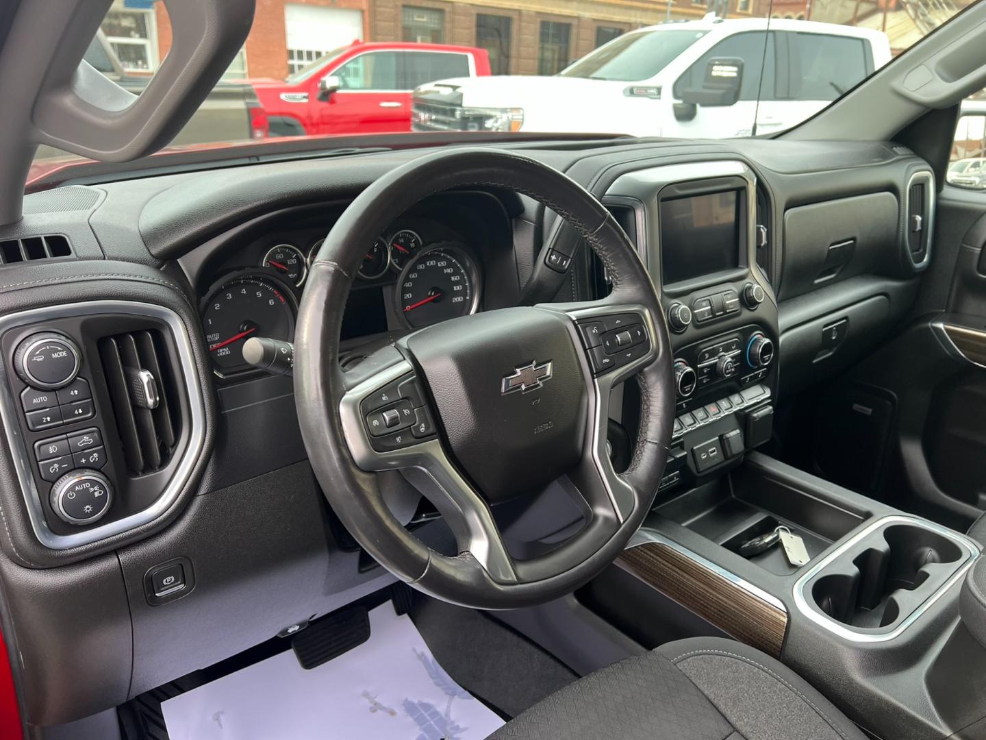 2021 Maroon /Charcoal Chevrolet Silverado 1500 Trail Boss (1GCPYFEL5MZ) with an 6.2L DI V8 engine, automatic transmission, located at 116 5th Avenue South, Lewistown, MT, 59457, 47.063877, -109.427879 - Explore the Rugged Elegance of Our Pre-Owned 2021 Chevrolet Silverado 1500 Crew Cab Trail Boss with a Mighty 6.2L Engine! Unleash the power of the open road with our exceptional 2021 Chevrolet Silverado 1500 Crew Cab Trail Boss. This pre-owned gem is equipped with a formidable 6.2L engine, delive - Photo#13